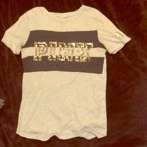 pink brand grey and black with gold t- shirt